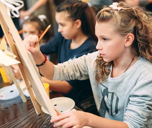 Young lady making art